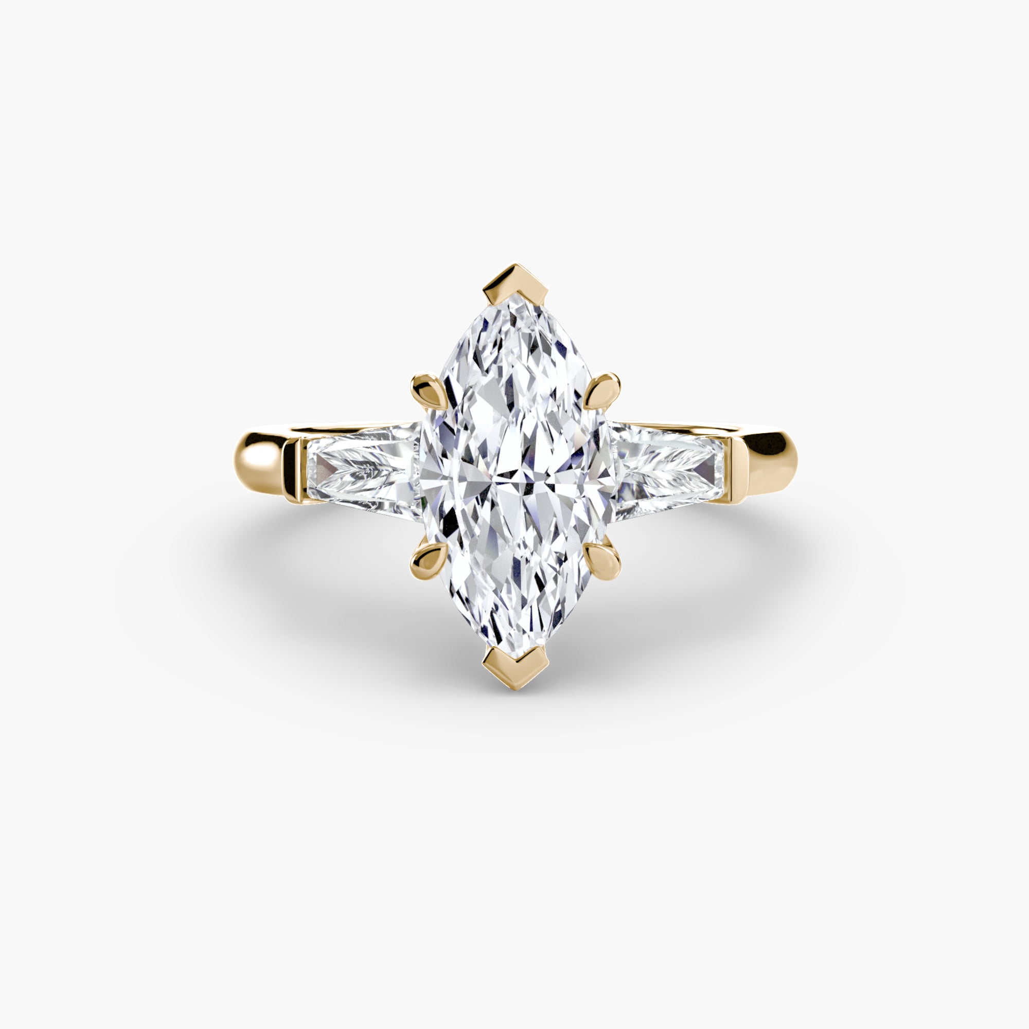 The Gratia Marquise Three Stone Ring