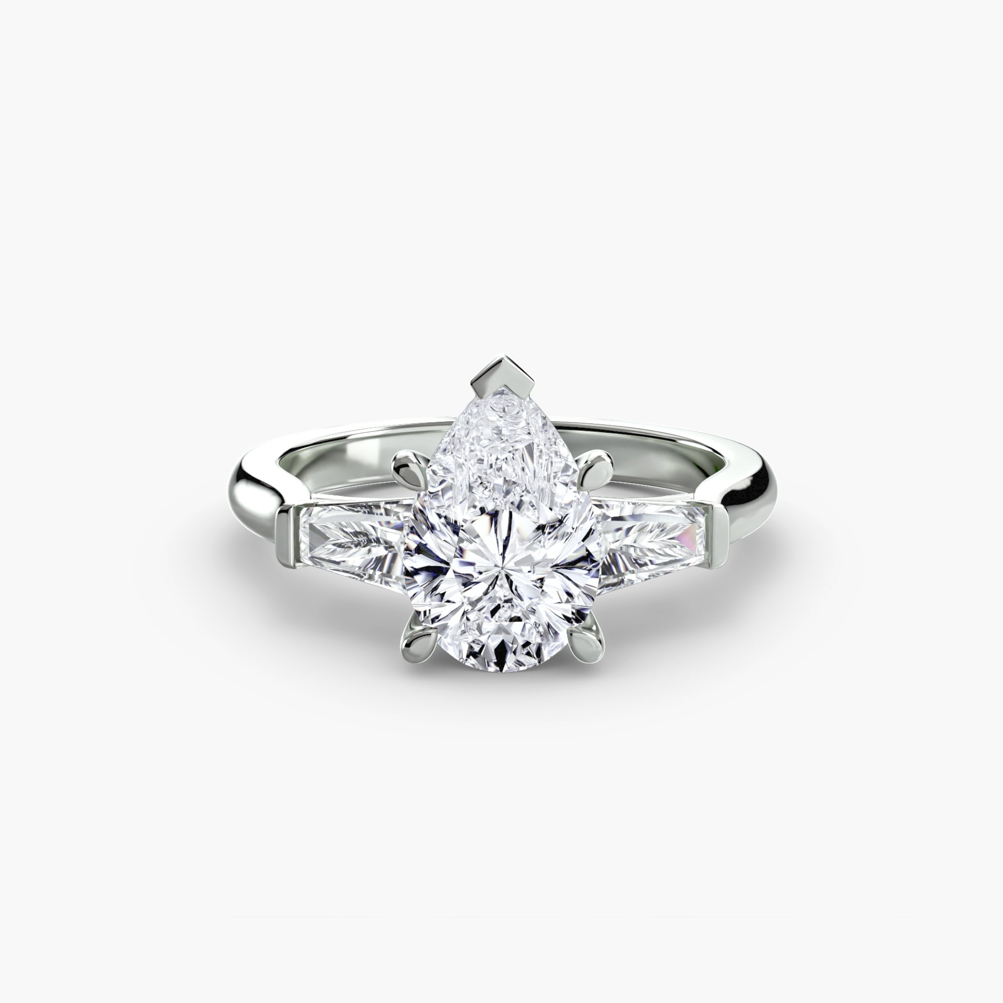 The Gratia Pear Three Stone Ring